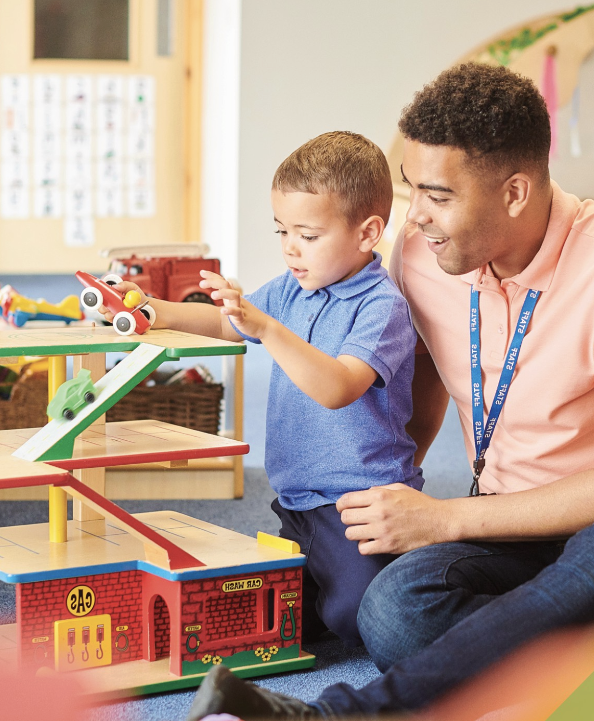 Early childhood educator with young children